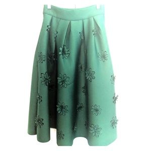 Full aline midi skirt in emerald green.